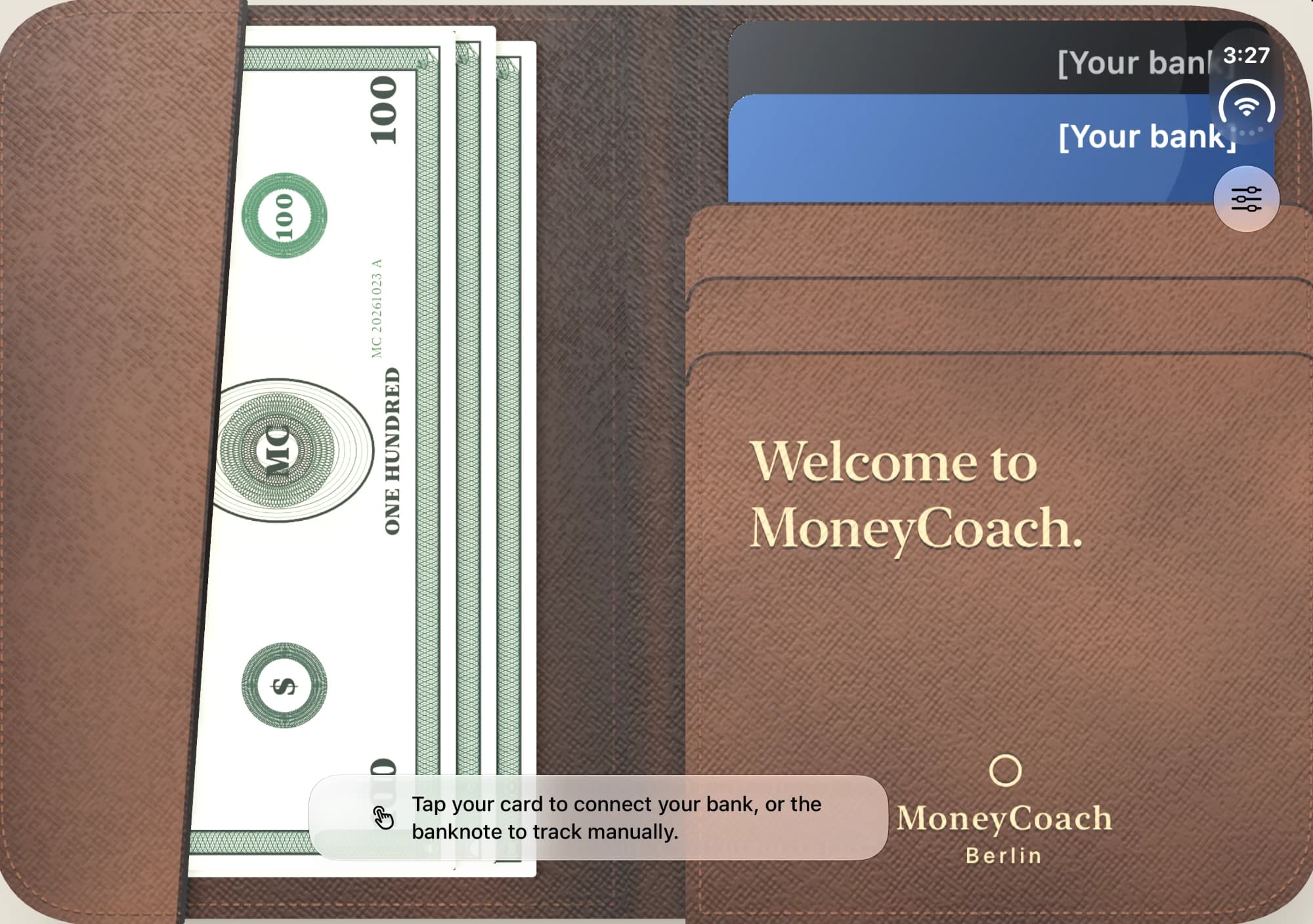 An early run of the wallet: a stack of banknotes in the left pocket, two placeholder bank cards and a welcome card on the right